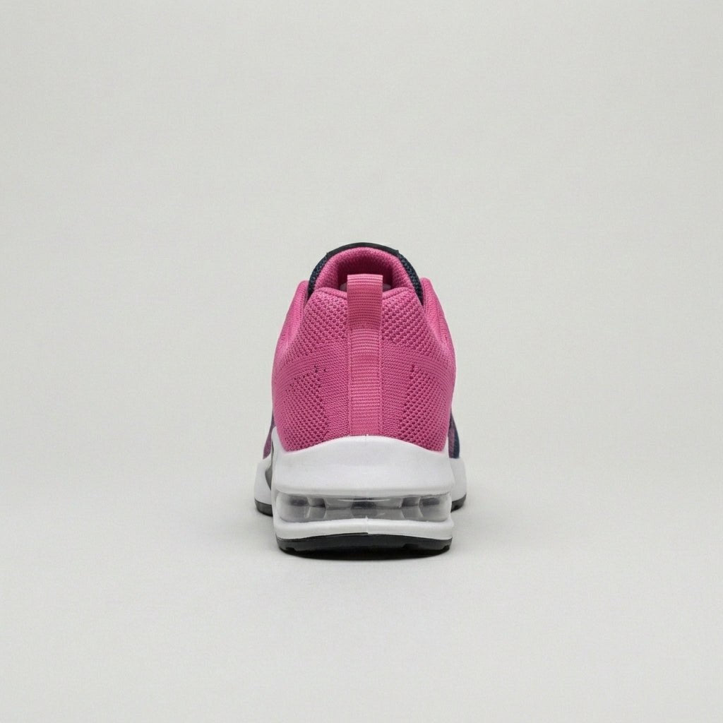 Close-up of women's knit sneakers by Christine Brewer showing their textured fabric and casual, comfortable style.