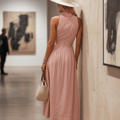 Sleeveless cotton maxi dress for women by Christine Brewer, flowing design with a relaxed fit and vibrant print.