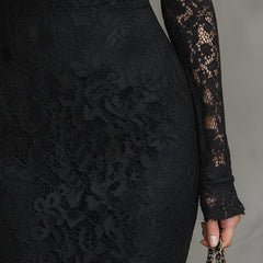 Black lace fishtail maxi dress by Christine Brewer featuring intricate lace details and a fitted evening dress silhouette.