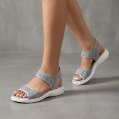 Gray knit ankle-strap sandals for women by Christine Brewer, stylish and comfortable women's shoes with ankle strap detail.