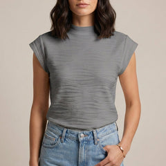 Gray high neck cap sleeve summer top for women by Christine Brewer, shown on a hanger.