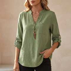 Green V-neck linen summer blouse for women by Christine Brewer, flowy and lightweight top perfect for warm weather.