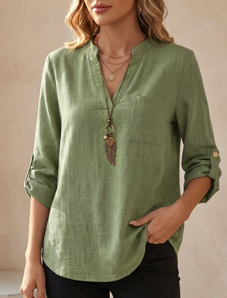 Green V-neck linen summer blouse for women by Christine Brewer, flowy and lightweight top perfect for warm weather.