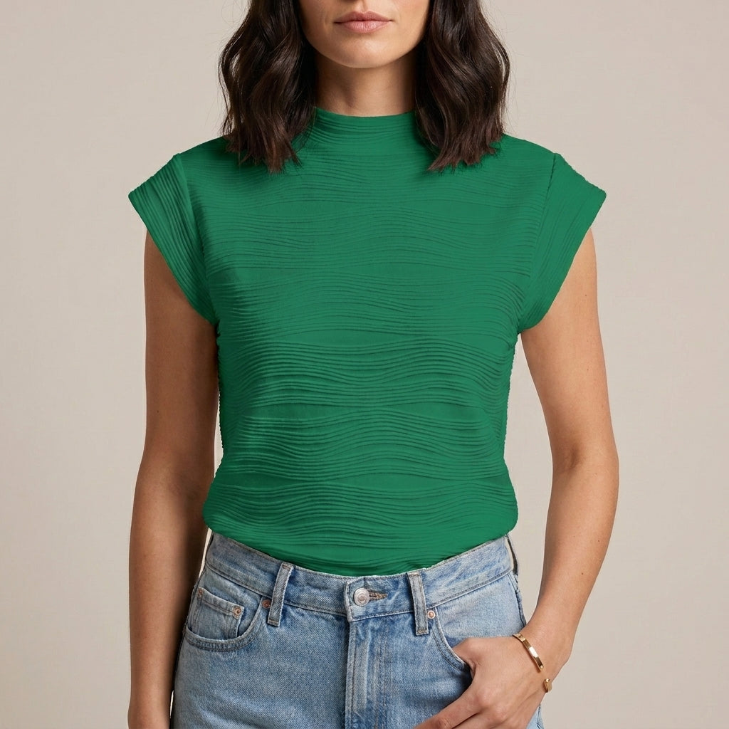 Green high-neck cap sleeve summer top for women by Christine Brewer, stylish and lightweight for warm weather.