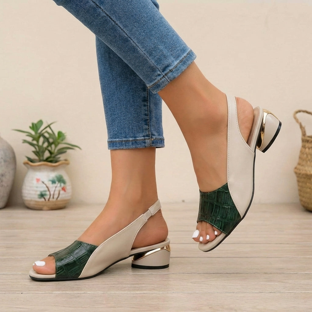 Green textured slingback block heel sandals with open toe and gold accent by Christine Brewer