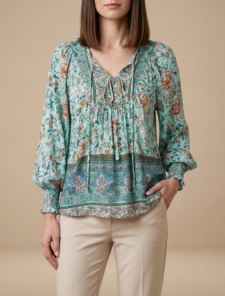 Green floral summer blouse for women with long sleeves made of linen, by Christine Brewer, stylish and lightweight top.