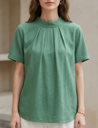 Green high-neck short sleeve summer blouse for women by Christine Brewer, featuring a stylish and comfortable top.