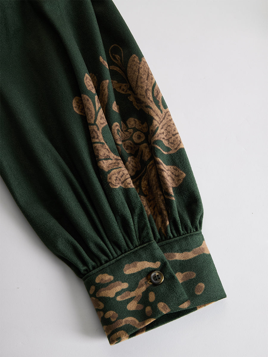Green faux suede tassel maxi dress for women by Christine Brewer, featuring a flowing silhouette and stylish tassel details.