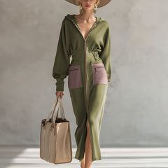 Green long sleeve maxi dress by Christine Brewer, elegant evening dress with flowing fabric and fitted waist.