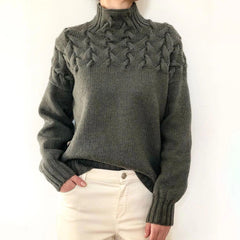 Grey women's turtleneck sweater from Christine Brewer's Tessa knitwear collection, featuring a cozy, fitted design.