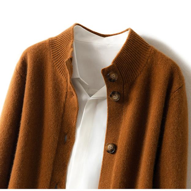 Cream-colored Christina cashmere high neck cardigan for women, featuring a cozy, soft knit and elegant fit from Christine Brewer.