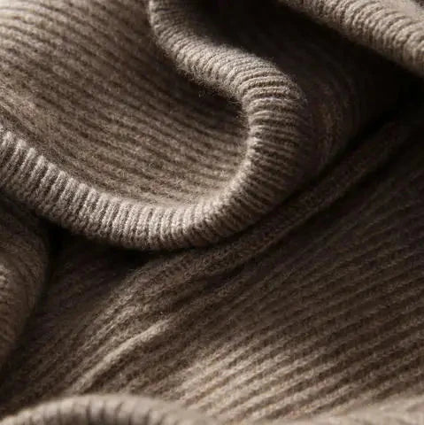 Christine Brewer Claudia cashmere hoodie for women, soft beige with a relaxed fit and hood, shown on a model.
