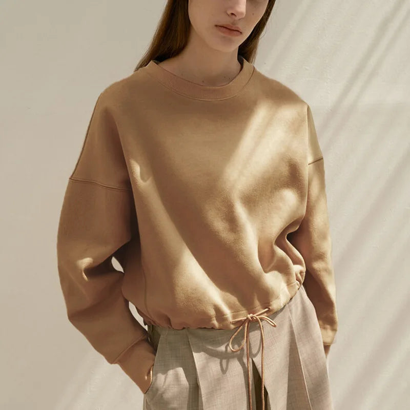Women’s oversized hoodie sweatshirt by Christine Brewer, featuring a relaxed fit and cozy design in soft fabric.