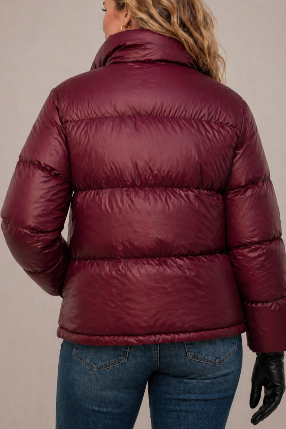 Insulated hooded quilted puffer jacket for women by Christine Brewer, featuring a cozy, stylish design perfect for cold weather.