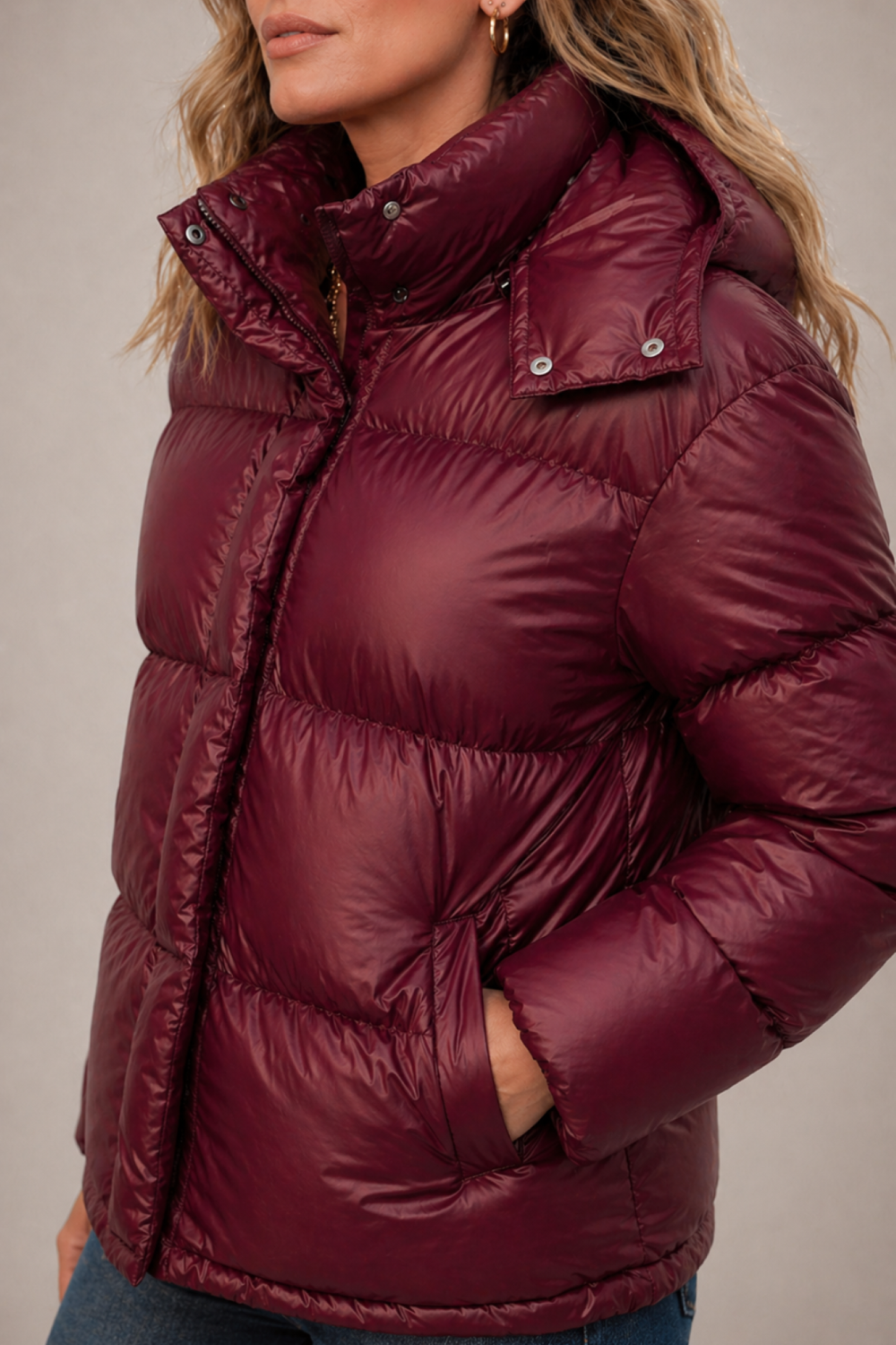 Insulated hooded quilted puffer jacket for women by Christine Brewer, featuring a cozy hood and stylish quilted design.