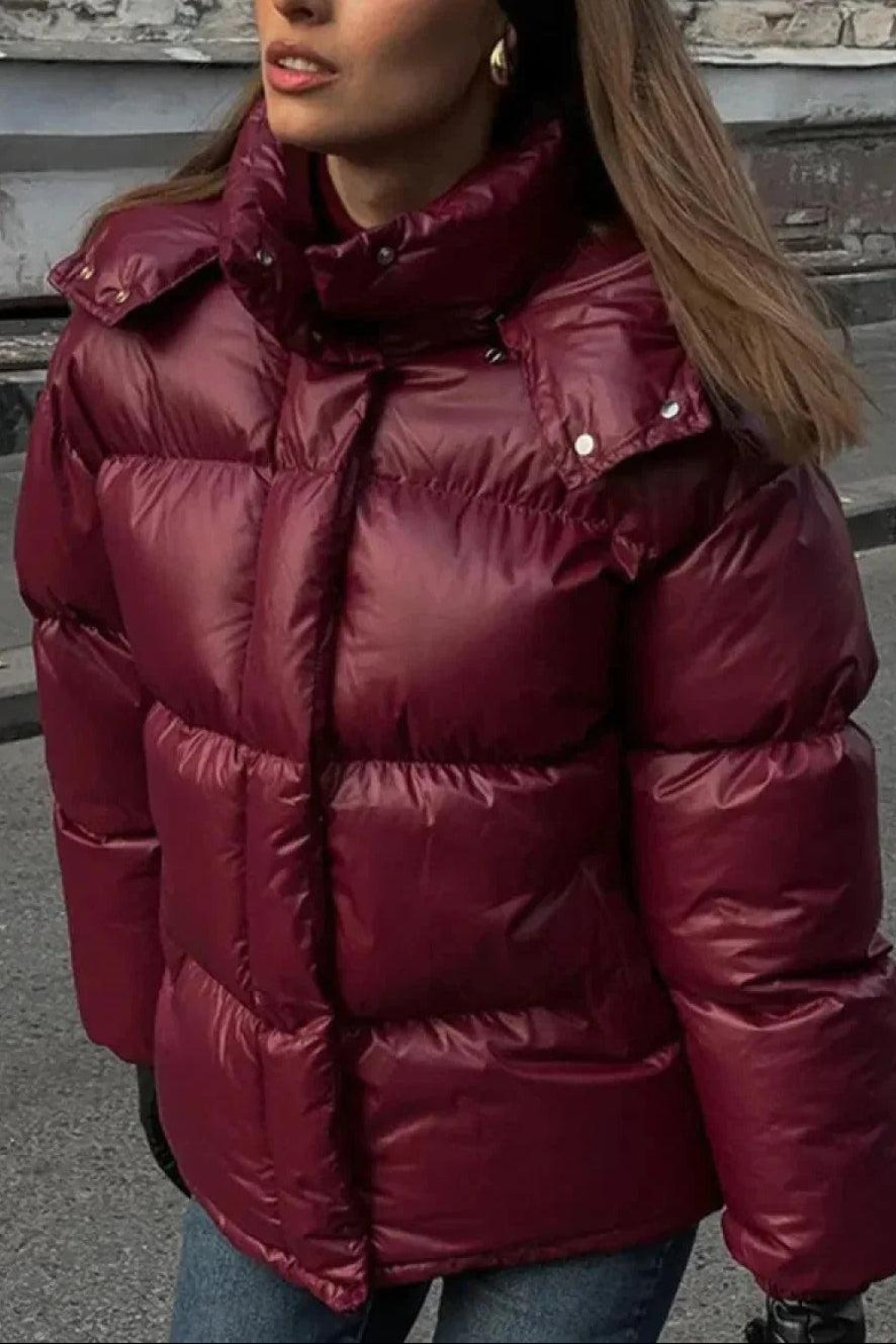 Christine Brewer Delilah women's hooded quilted puffer jacket with insulated design, showcasing its padded, warm, and stylish appearance.