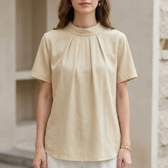 Ivory yellow summer blouse for women by Christine Brewer, high neck short sleeve top with a lightweight, stylish design.