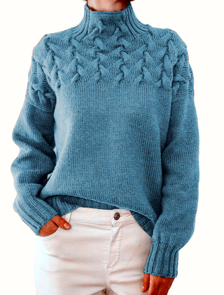 Light blue women's turtleneck sweater from Christine Brewer's Tessa knitwear collection, featuring a cozy, fitted design.