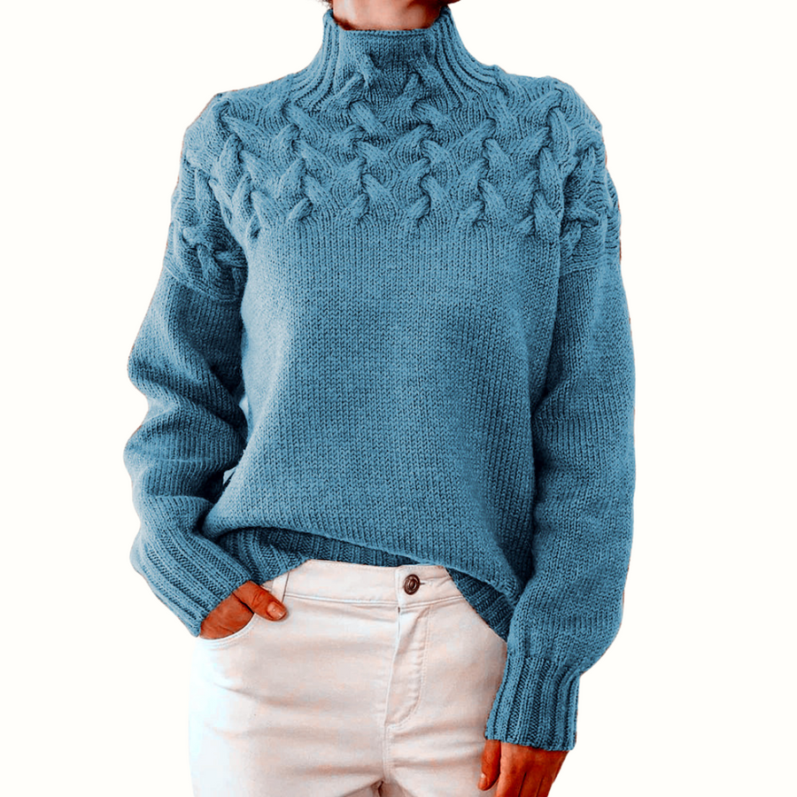 Light blue women's turtleneck sweater from Christine Brewer's Tessa knitwear collection, featuring a cozy, fitted design.