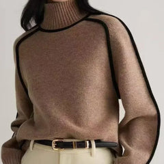 Brown oversized turtleneck sweater by Christine Brewer with luxe wool edge trim, perfect for autumn, featuring a tailored versatile design.