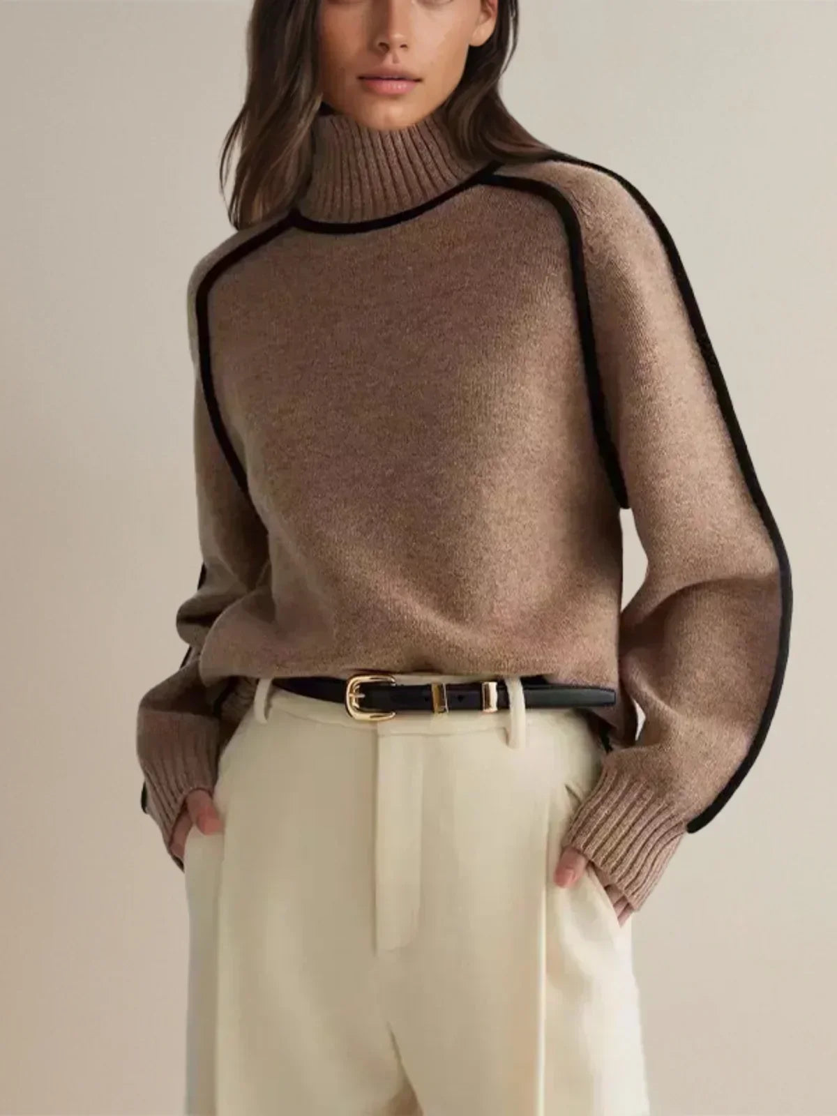 Brown oversized turtleneck sweater by Christine Brewer with luxe wool edge trim, perfect for autumn, featuring a tailored, versatile style.