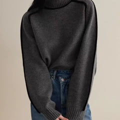 Black Clara turtleneck sweater for women by Christine Brewer featuring luxe wool and edge trim, perfect for autumn.