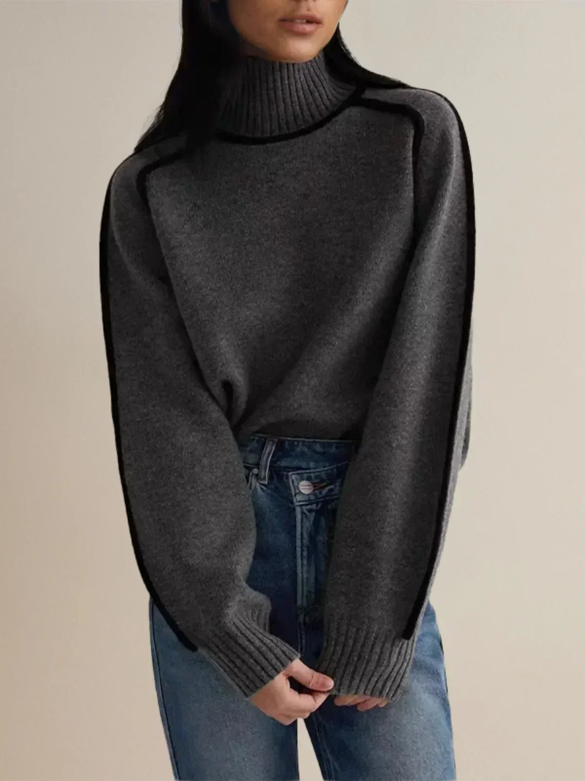 Black Clara turtleneck sweater for women by Christine Brewer featuring luxe wool and edge trim, perfect for autumn.