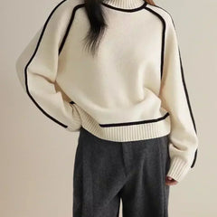 White Clara turtleneck sweater for women by Christine Brewer, featuring luxe wool fabric and stylish edge trim for autumn wear.
