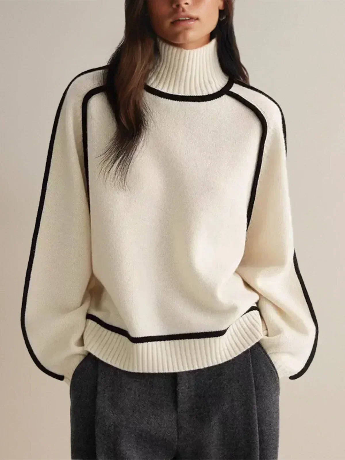White oversized turtleneck sweater by Christine Brewer with luxe wool edge trim, perfect for autumn, featuring a tailored, versatile design.