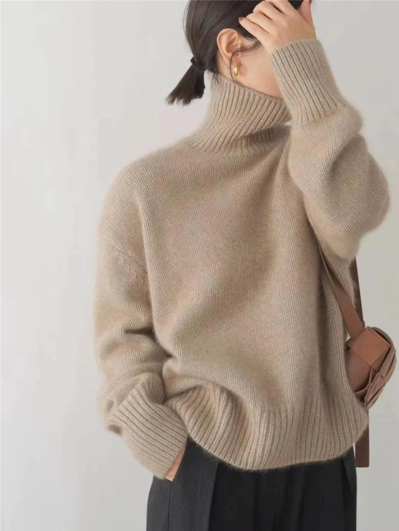 Light khaki high neck sweater for women by Christine Brewer, featuring a cozy fit and stylish design.