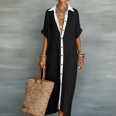 Linen maxi dress for women by Christine Brewer, flowing lightweight fabric, sleeveless design, and elegant midi length.