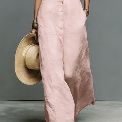 Sleeveless linen maxi dress for women by Christine Brewer, flowing fabric with a relaxed fit and elegant design.