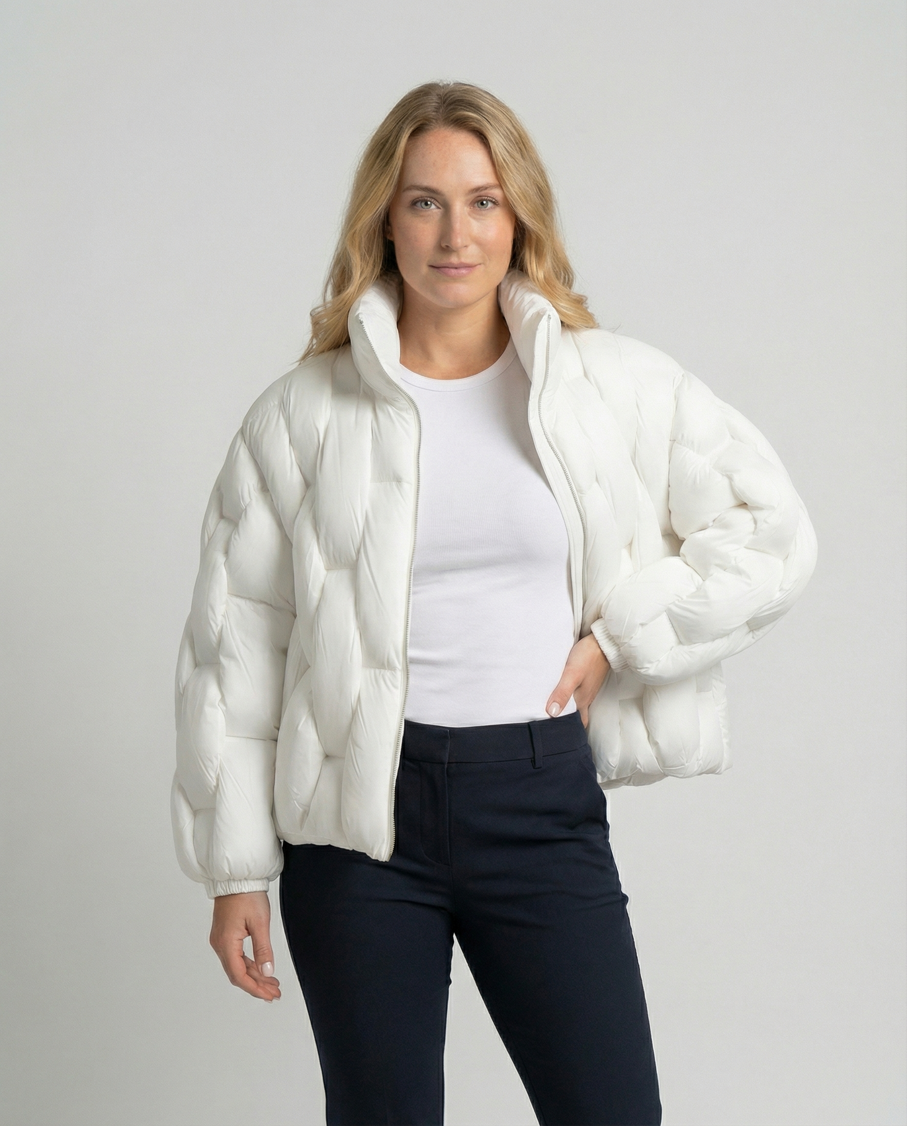Woman wearing the Clara Cosy Puffer Jacket for Women by Christine Brewer, showing the upper body and stylish puffer design.