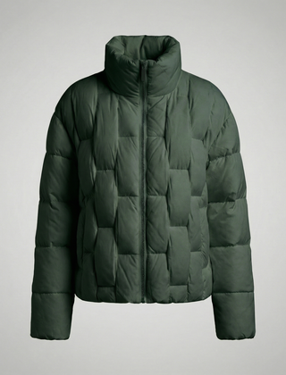 Green Clara Cosy Puffer Jacket for Women by Christine Brewer, shown with its quilted design and padded collar.