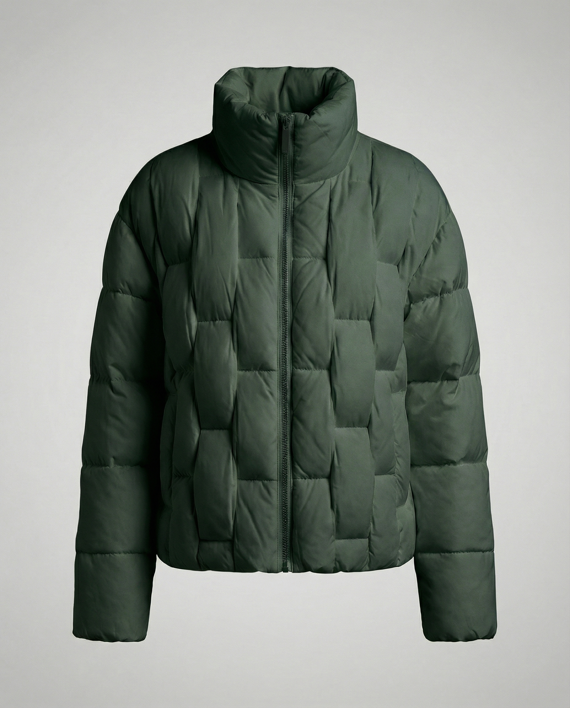 Green Clara Cosy Puffer Jacket for Women by Christine Brewer, shown with its quilted design and padded collar.