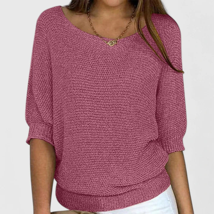 Pink women's sweater from Christine Brewer's Grace collection, featuring a versatile chic design and soft knit fabric.