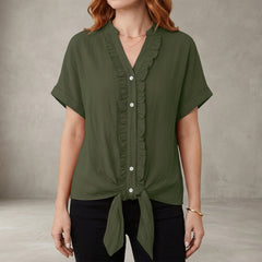 Military green summer blouse for women by Christine Brewer, features a V-neck, denim fabric, and ruffle details in a casual style.