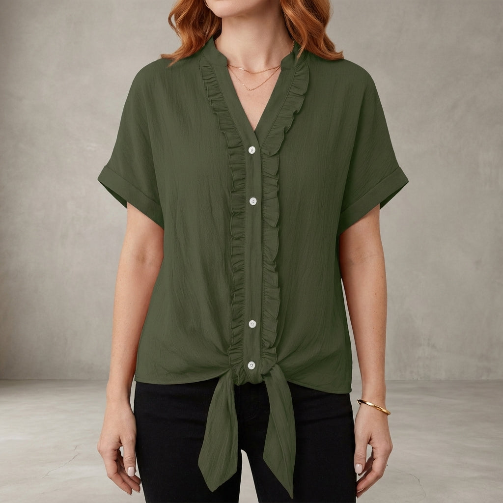 Military green summer blouse for women by Christine Brewer, features a V-neck, denim fabric, and ruffle details in a casual style.