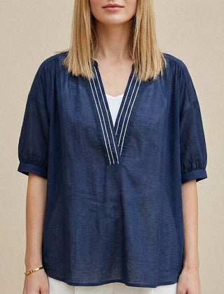 Navy blue women's summer blouse with V-neck and puff sleeves, stylish top by Christine Brewer, perfect for warm weather.