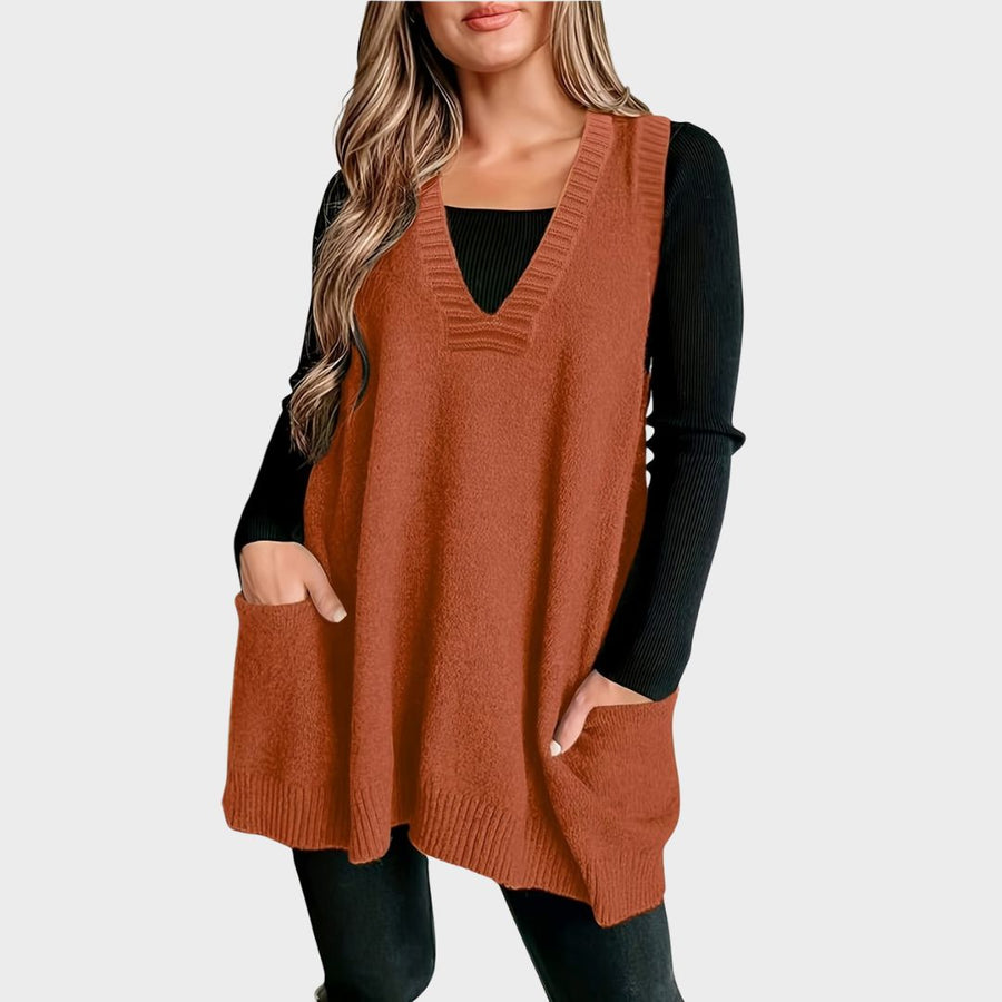 Nienke Huiswerk wearing the Christine Brewer Kelly V-Neck Sleeveless Knit Sweater Vest for women, showing the soft fabric and sleeveless design.