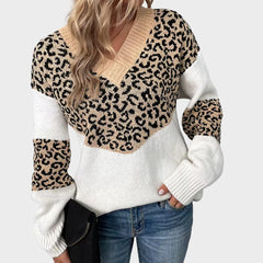 Nienke Huiswerk wearing the Hailey V-neck leopard print sweater for women by Christine Brewer, showcasing the stylish animal print design.