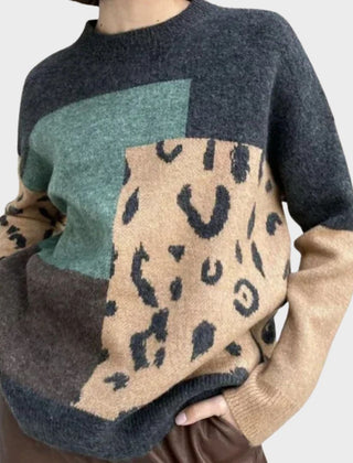 Heather leopard print graphic sweater for women by Christine Brewer, showing a cozy knit sweater with bold animal print design.
