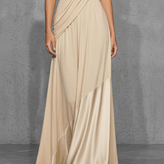 Nude satin evening dress by Christine Brewer featuring a sleek, elegant design with a fitted silhouette and subtle sheen.