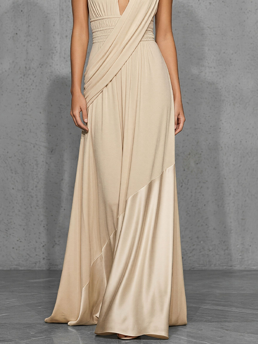 Nude satin evening dress by Christine Brewer featuring a sleek, elegant design with a fitted silhouette and subtle sheen.