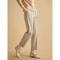Women’s wool tapered trousers by Christine Brewer, featuring a tailored fit in soft merino wool fabric.