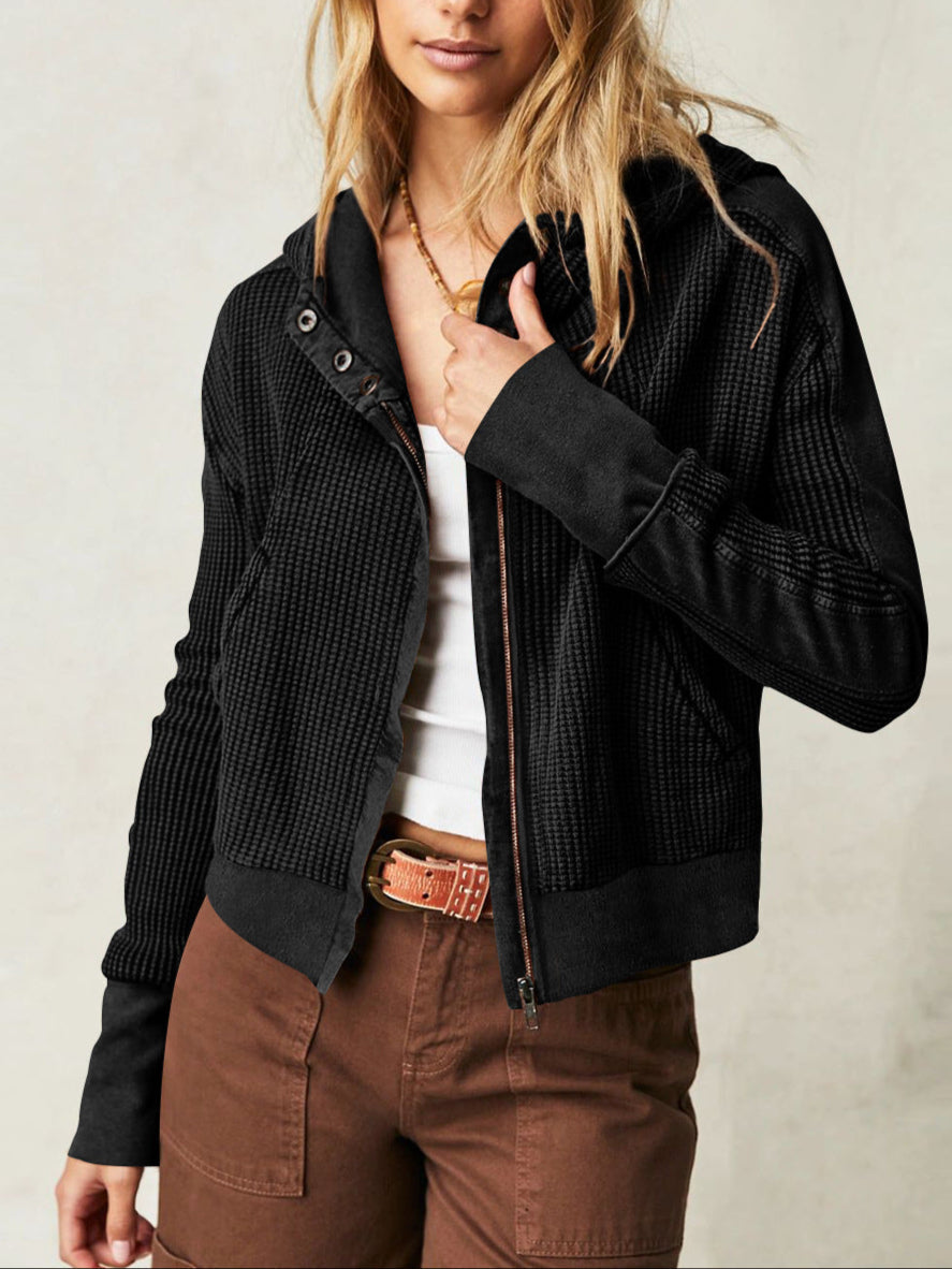 Women’s cropped hooded hoodie by Christine Brewer featuring a relaxed fit and front pocket, in soft fabric with a drawstring hood.