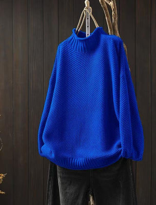 Cream-colored knit sweater for women by Christine Brewer, featuring a cozy Jade design with a textured pattern.