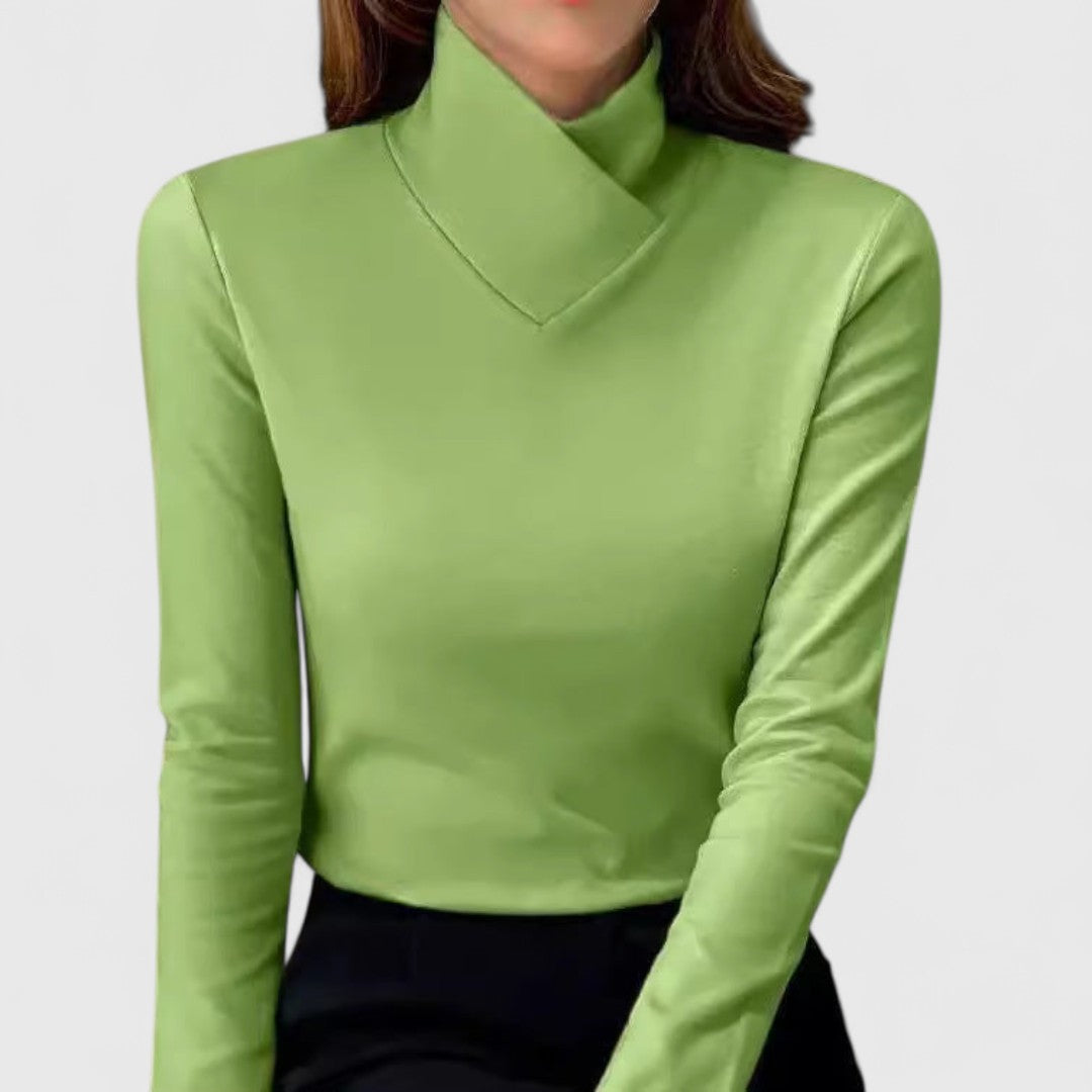 Charlotte Versatile Chic Turtleneck Sweater by Christine Brewer, shown in a cozy knit with a fitted turtleneck and long sleeves.