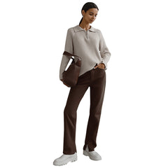 Cream-colored knit sweater for women by Christine Brewer, featuring a cozy, textured design and a relaxed fit.