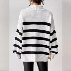 Women’s knit sweater by Christine Brewer featuring a cozy, textured design in a neutral color.